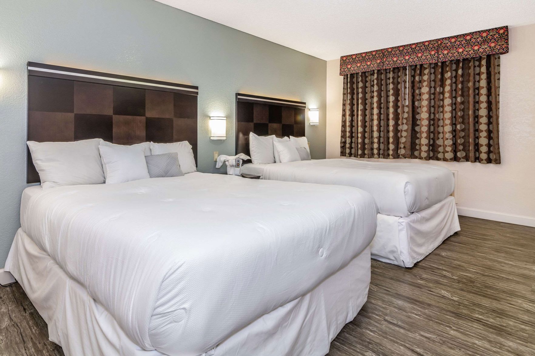 Pillowtop beds, desk, laptop workspace, blackout drapes