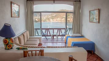 Suite | Camas con pillow-top, minibar y caja de seguridad en la habitación