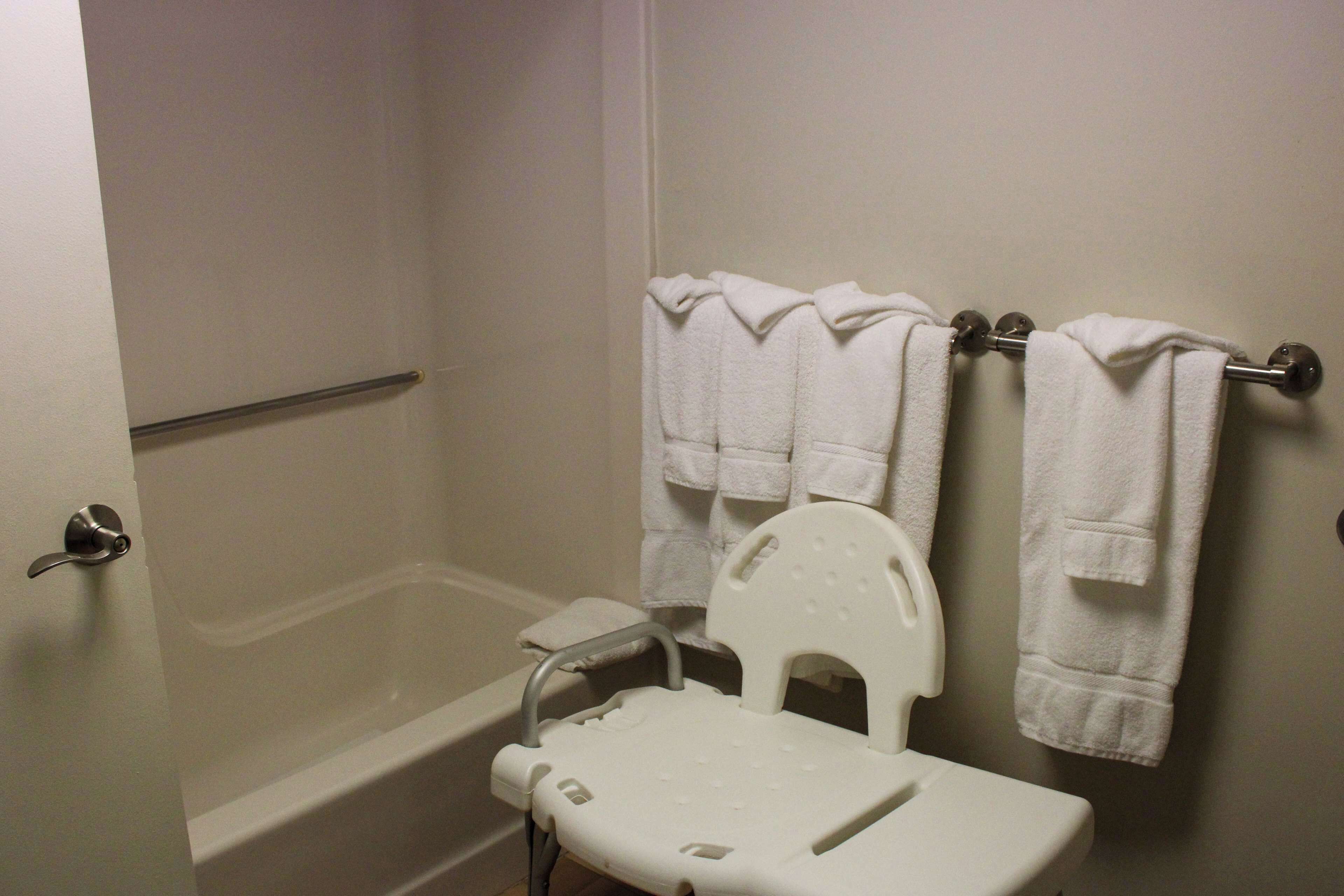 exclusive room, 2 queen beds | bathroom | combined shower/bathtub, designer toiletries, hair dryer, towels