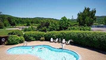 Indoor pool, seasonal outdoor pool, pool umbrellas, pool loungers