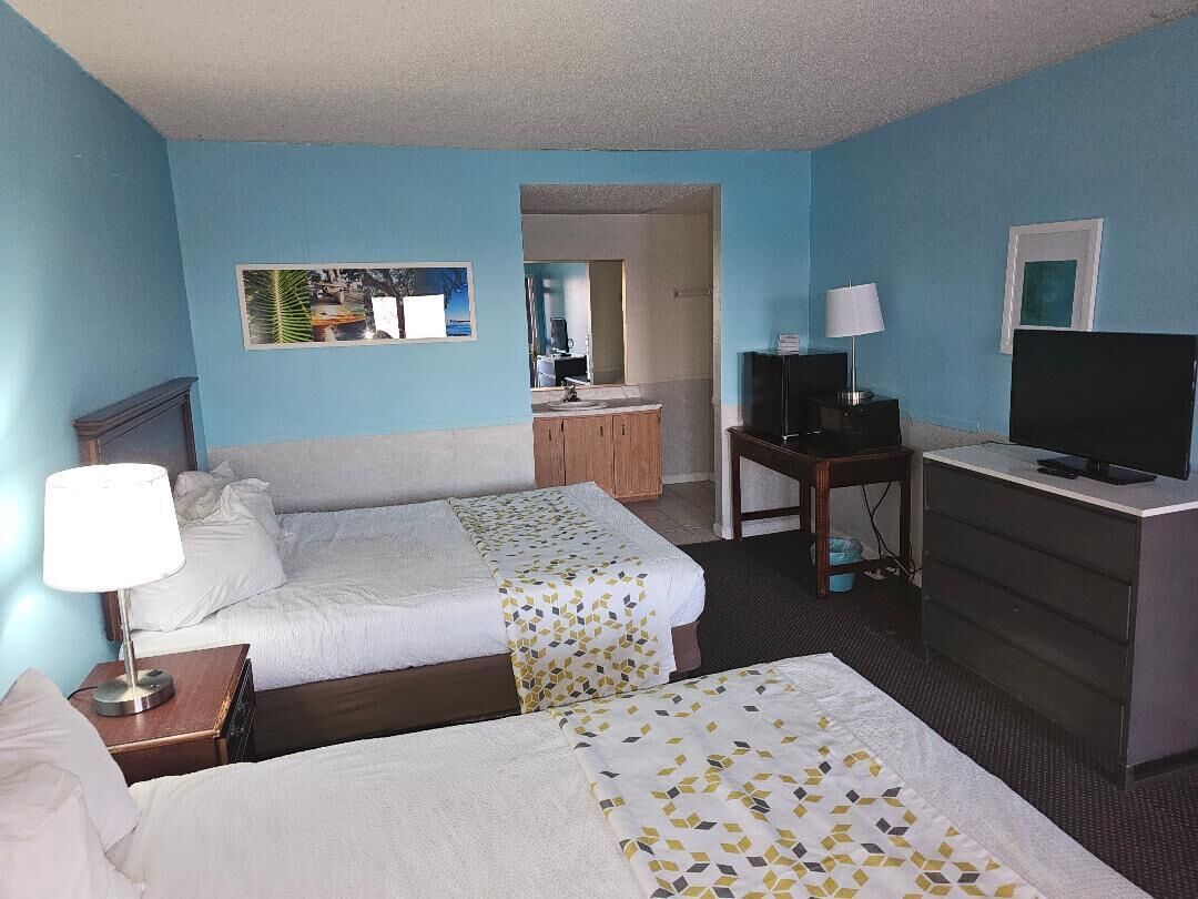 Standard Room, 2 Queen Beds, Lake View | Iron/ironing board, free WiFi, bed sheets