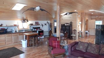 Deluxe Loft, Balcony, Lake View (Room (Goose Landing)) | Living area | TV, fireplace