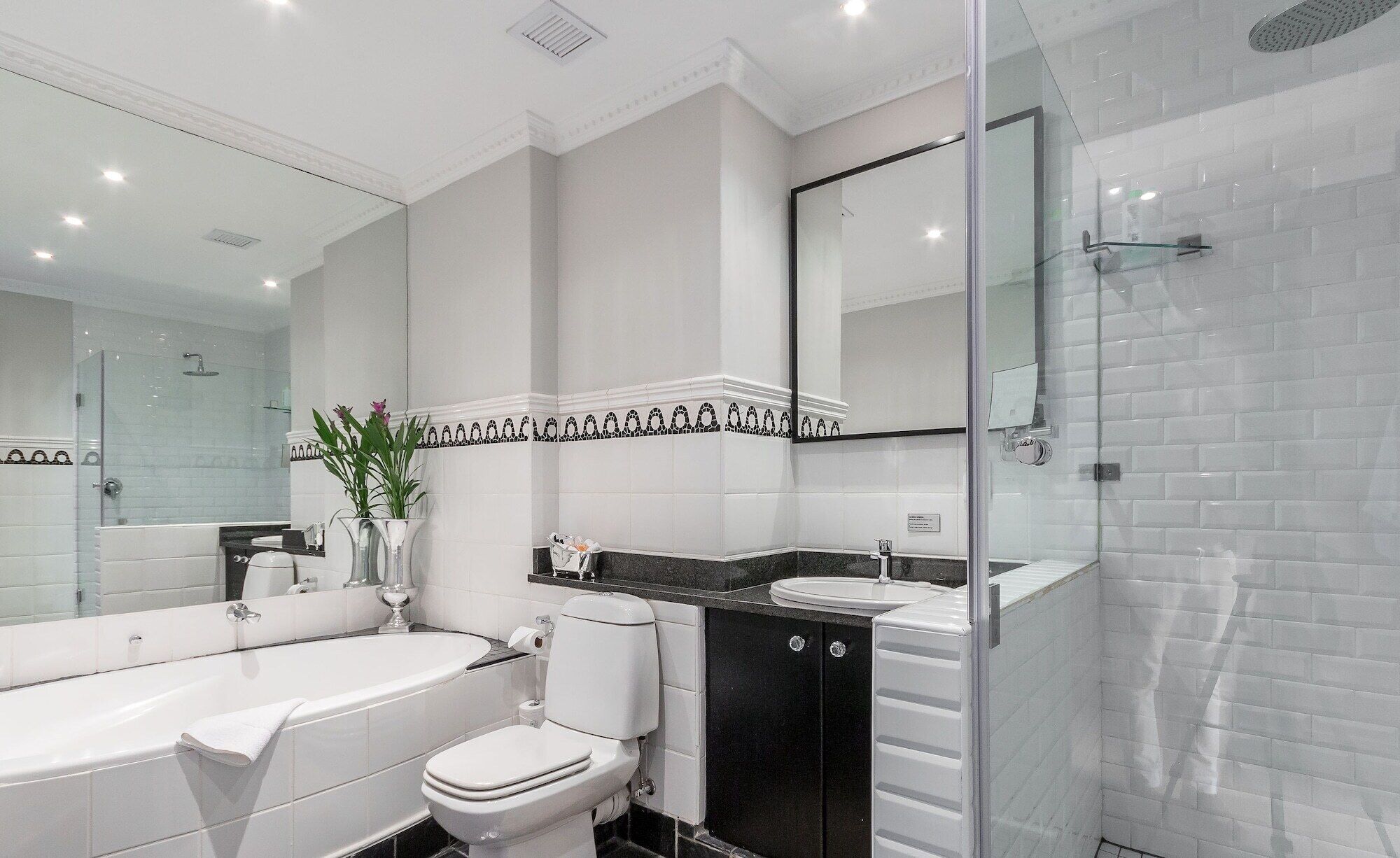bathroom | combined shower/bathtub, free toiletries, bathrobes, towels