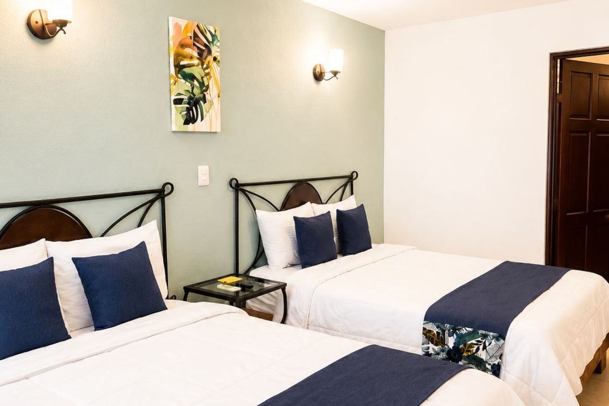 Standard Quadruple Room | Premium bedding, down comforters, Tempur-Pedic beds, in-room safe