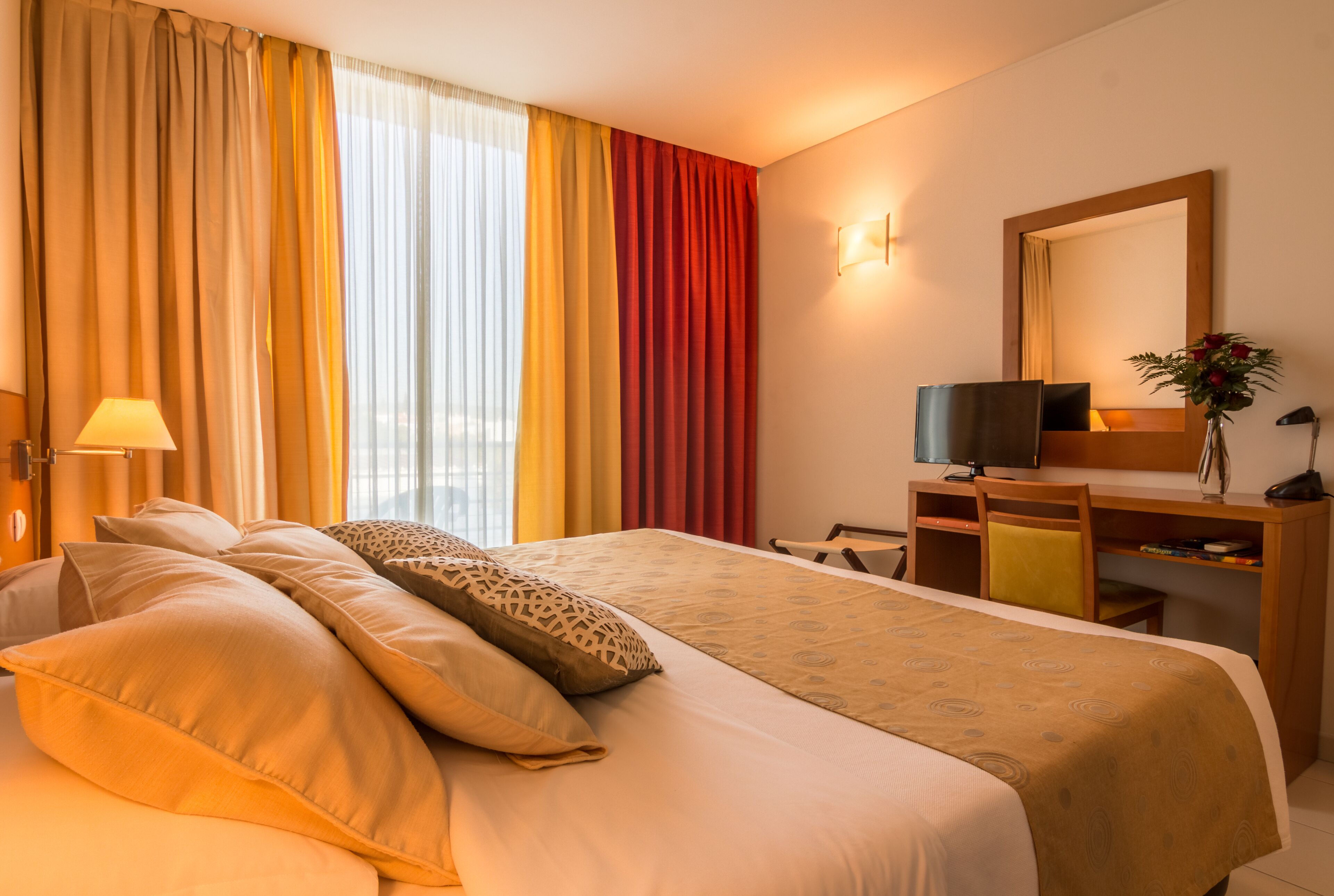 Minibar, desk, laptop workspace, blackout curtains