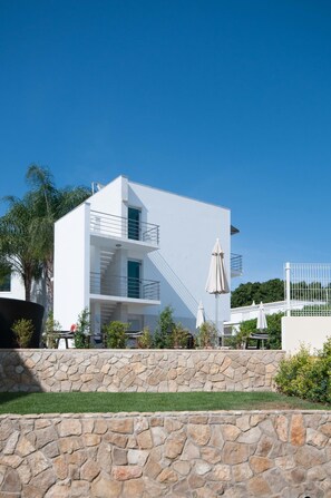 2 outdoor pools, pool umbrellas, pool loungers