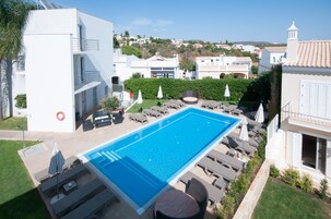 2 outdoor pools, pool umbrellas, sun loungers