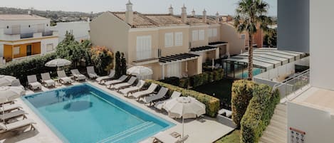 2 outdoor pools, pool umbrellas, sun loungers