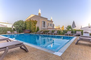 2 outdoor pools, pool umbrellas, sun loungers