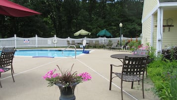 Seasonal outdoor pool, pool umbrellas