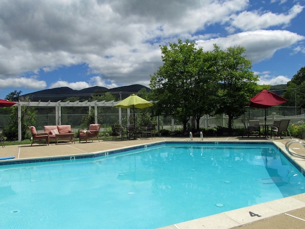 Seasonal outdoor pool, pool umbrellas