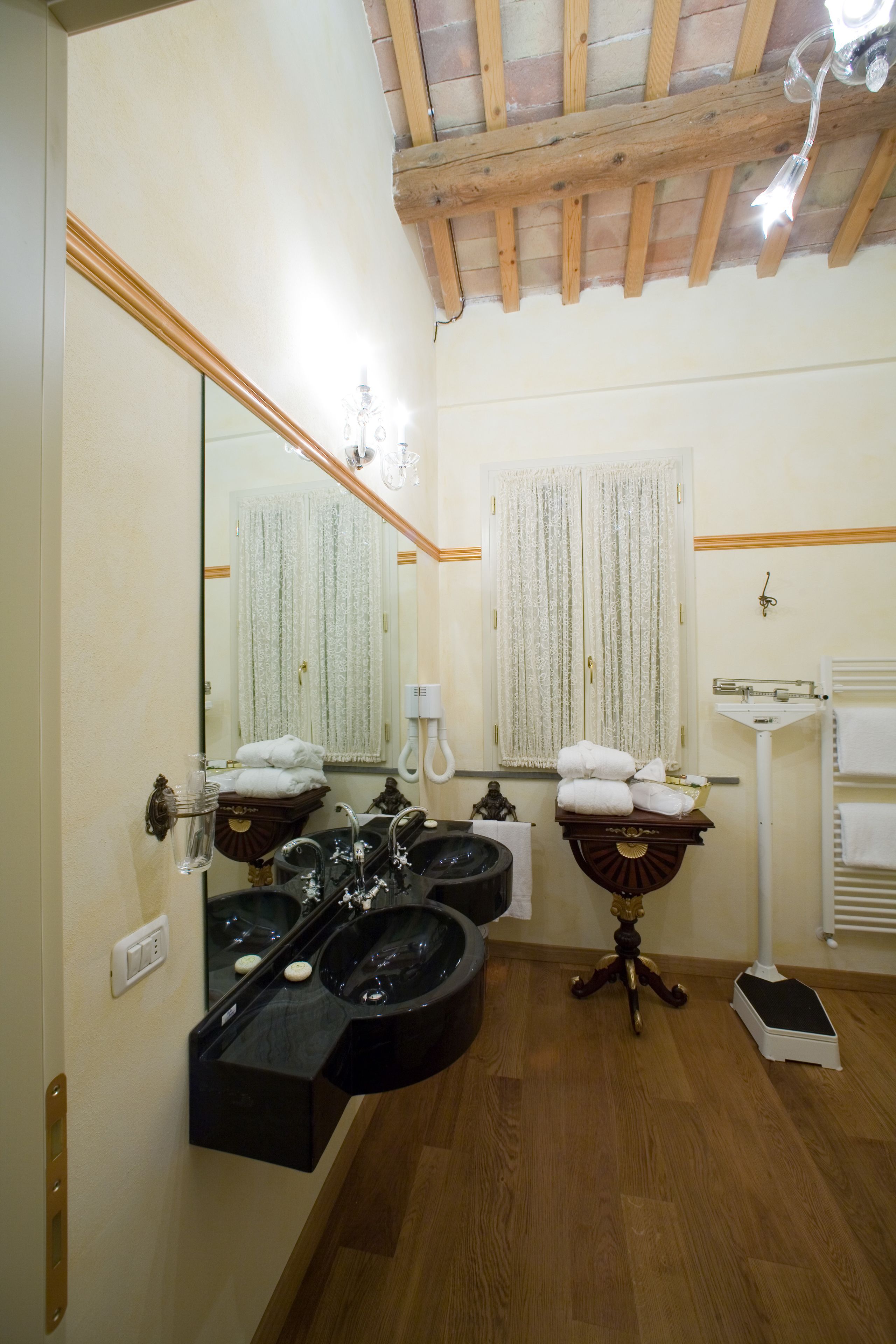 luxury suite, 1 bedroom, garden view | bathroom | rainfall showerhead, free toiletries, hair dryer, slippers