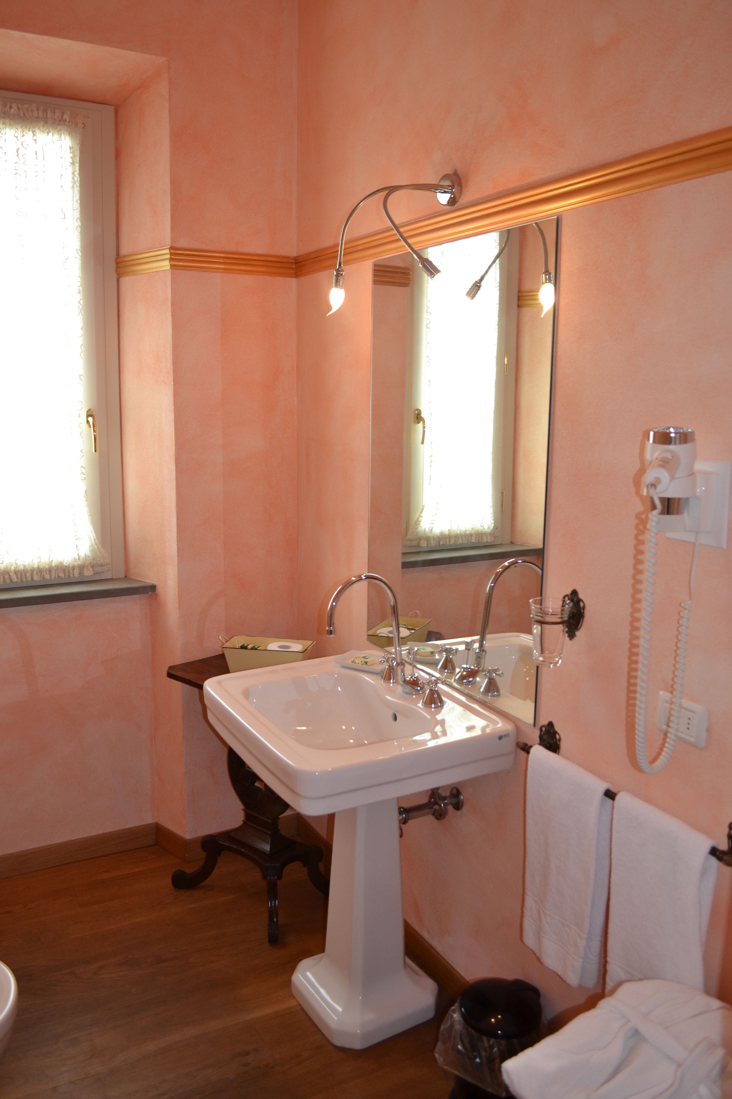 junior suite | bathroom | rainfall showerhead, free toiletries, hair dryer, slippers
