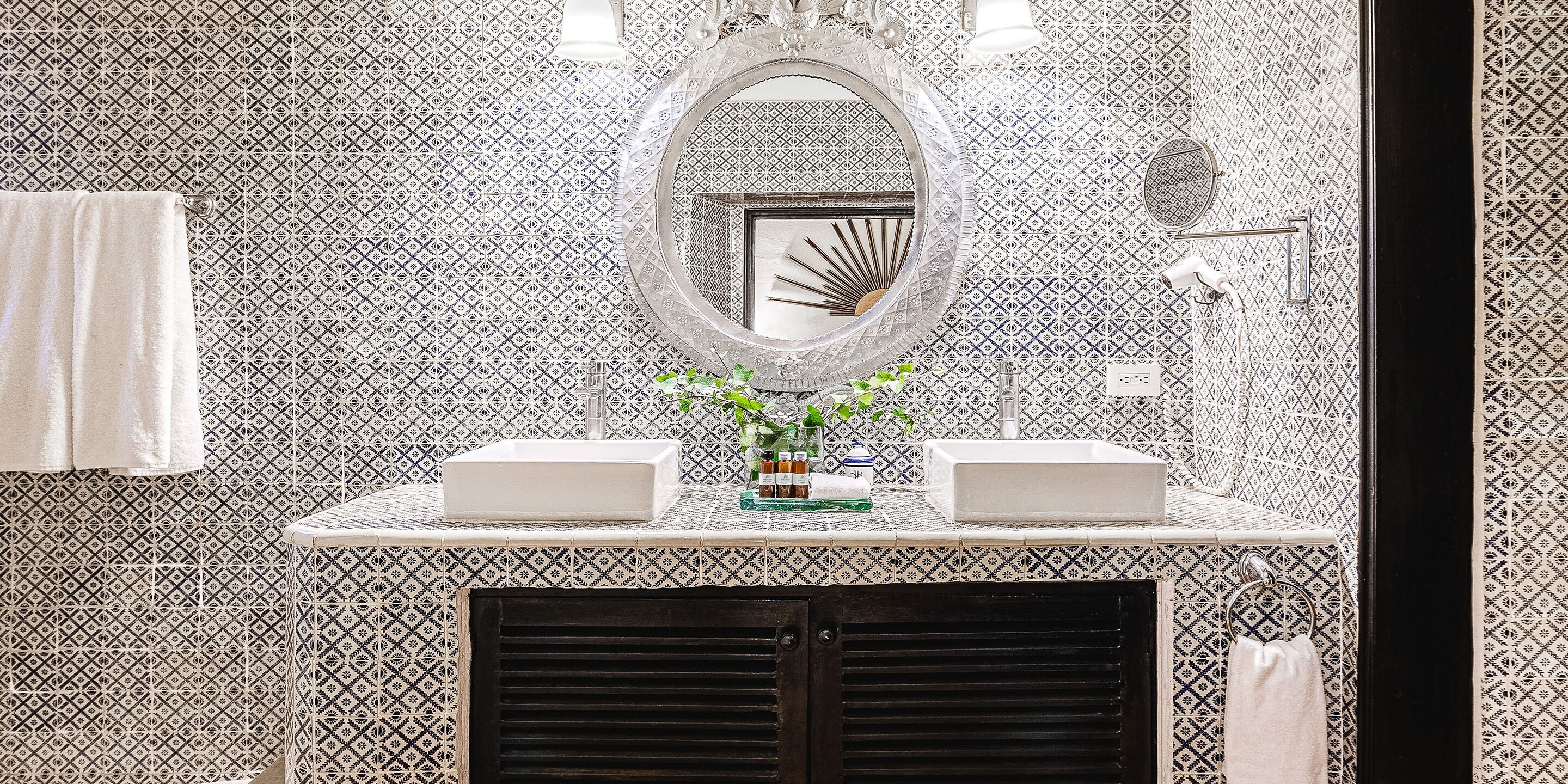 jr. suite | bathroom | rainfall showerhead, designer toiletries, hair dryer, bathrobes