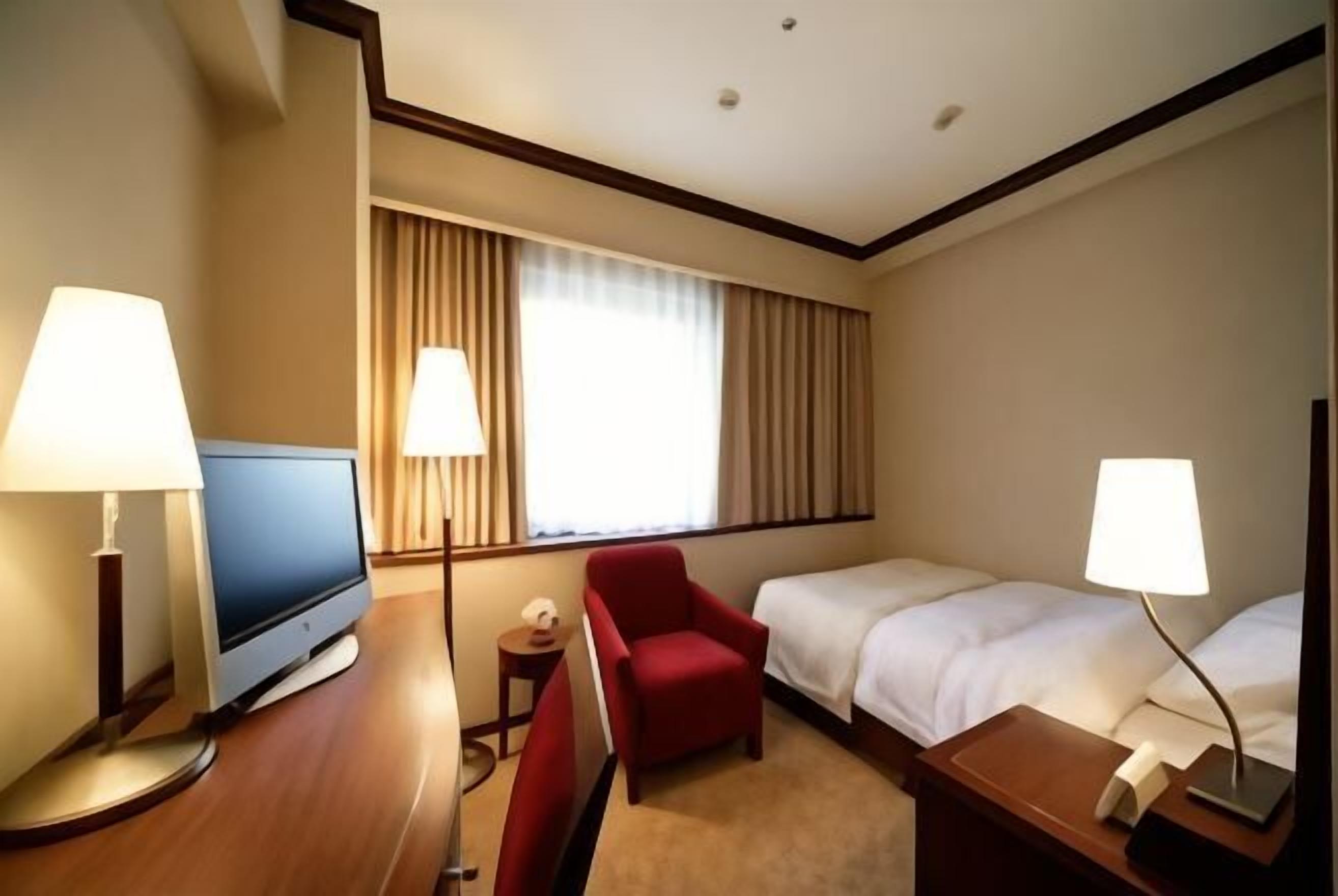 Down duvets, desk, blackout curtains, iron/ironing board