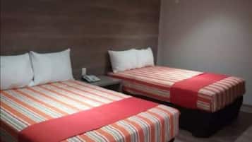 Habitación doble superior, 2 camas matrimoniales, baño en la habitación | Wifi gratis y ropa de cama