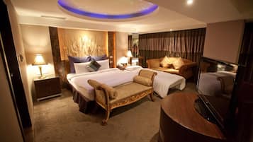 Down duvets, pillow-top beds, free minibar, in-room safe