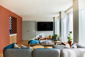 Premium bedding, down duvets, blackout curtains, iron/ironing board