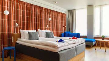 Premium bedding, down comforters, blackout drapes, iron/ironing board