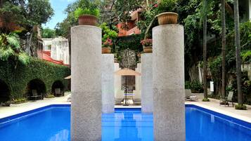 Outdoor pool, pool umbrellas, sun loungers