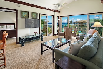Condo, 2 Bedrooms, Ocean View (Unit B402, 3 Bath) | Living area | 75-inch flat-screen TV with cable channels, TV, pay movies at Waipouli Beach Resorts & Spa Kauai by OUTRIGGER