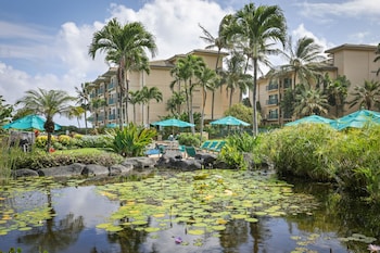 Sitting area in hotel lobby at Waipouli Beach Resorts & Spa Kauai by OUTRIGGER