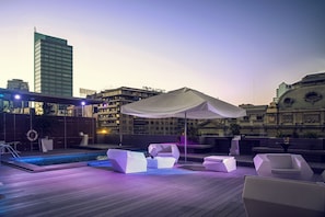 Outdoor pool, open 10:00 AM to 8:00 PM, free pool cabanas