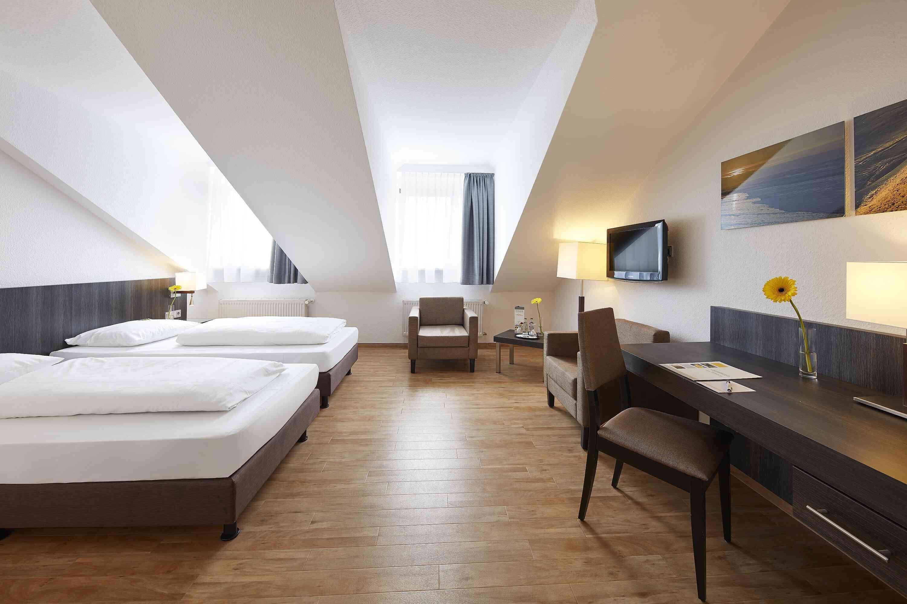 business twin room | in-room safe, desk, blackout curtains, iron/ironing board