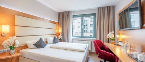 Desk, laptop workspace, blackout drapes, soundproofing