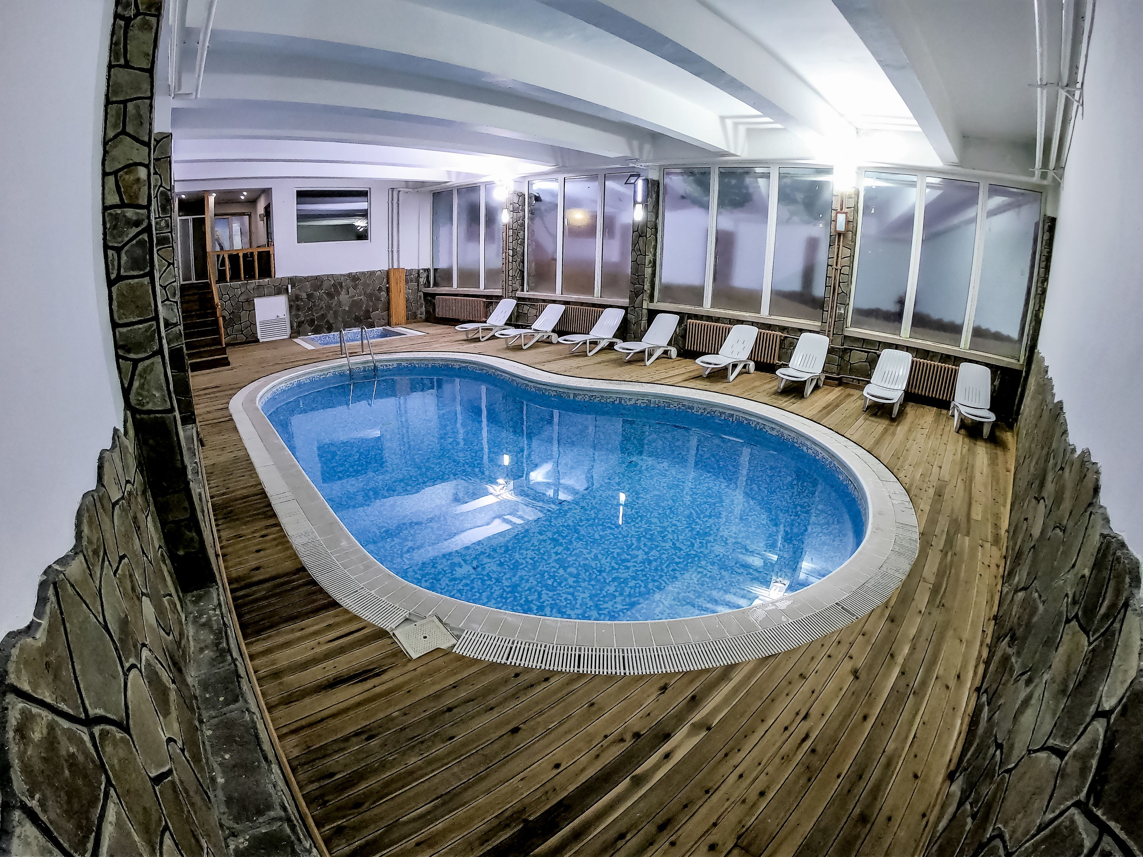 Indoor pool, sun loungers
