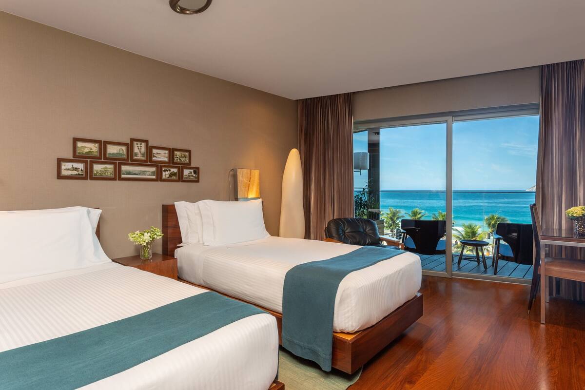 deluxe room, 2 single beds, oceanfront | 1 bedroom, minibar, in-room safe, desk