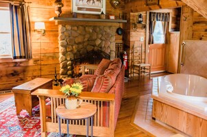 Carolina Log Cabin | Living area | 43-inch flat-screen TV with digital channels, TV, fireplace