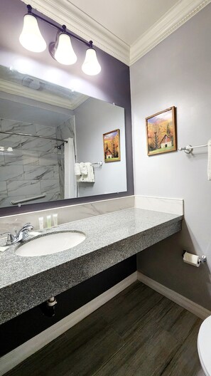 Room, 2 Queen Beds | Bathroom | Combined shower/tub, free toiletries, hair dryer, towels