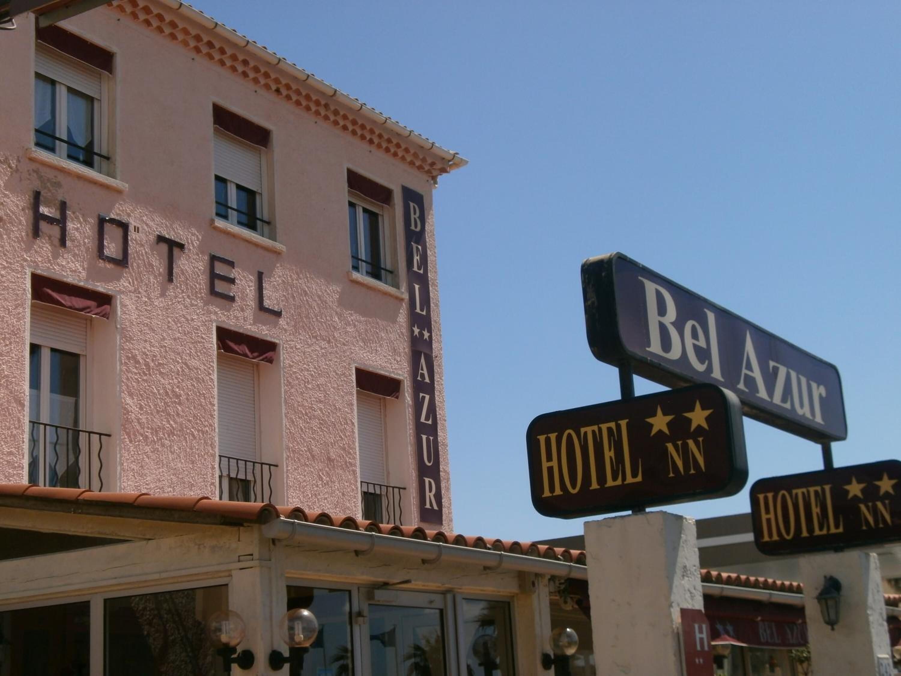 A hotel named "Bel Azur" with a sign indicating "HOTEL NN".