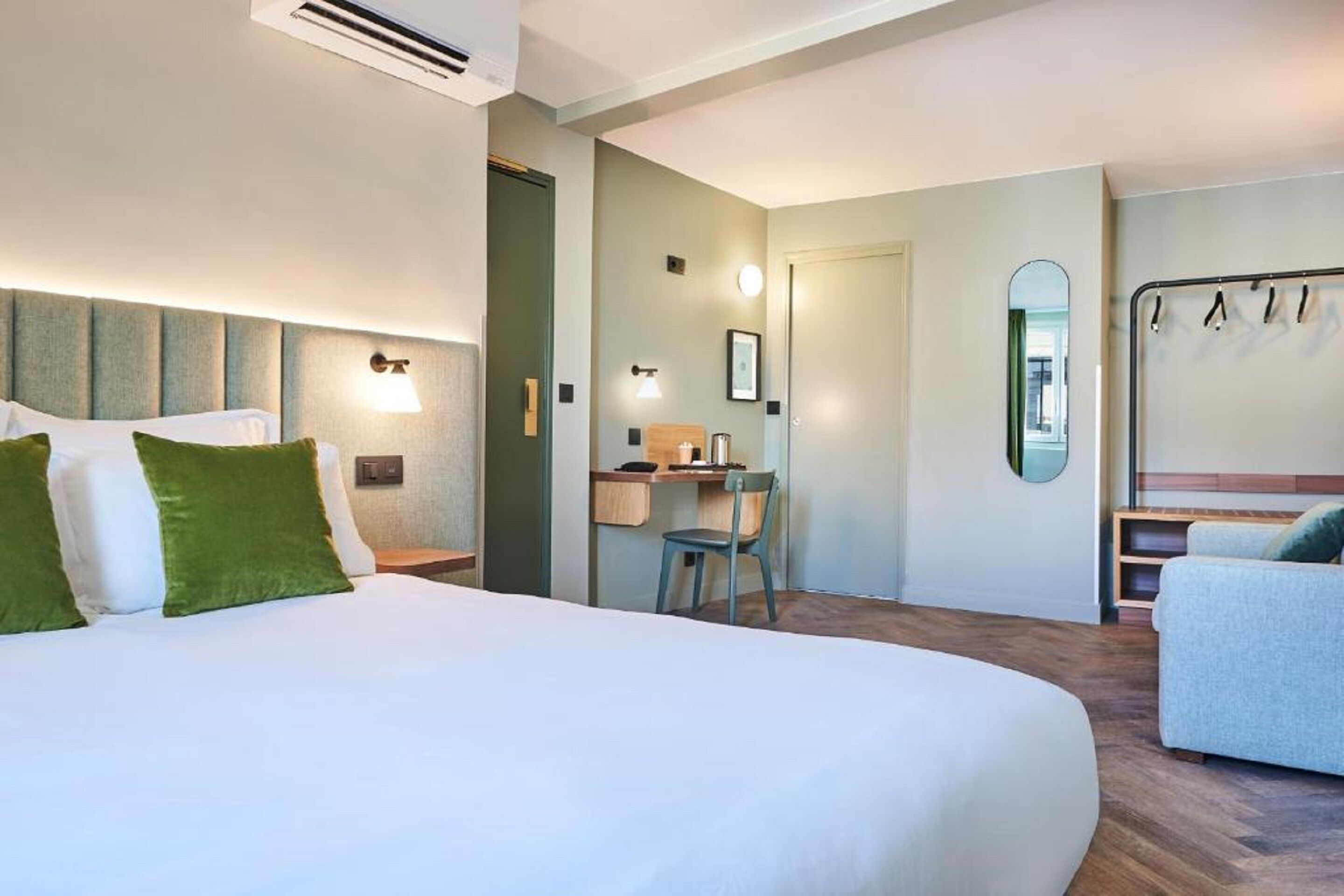 family room | in-room safe, desk, blackout curtains, soundproofing