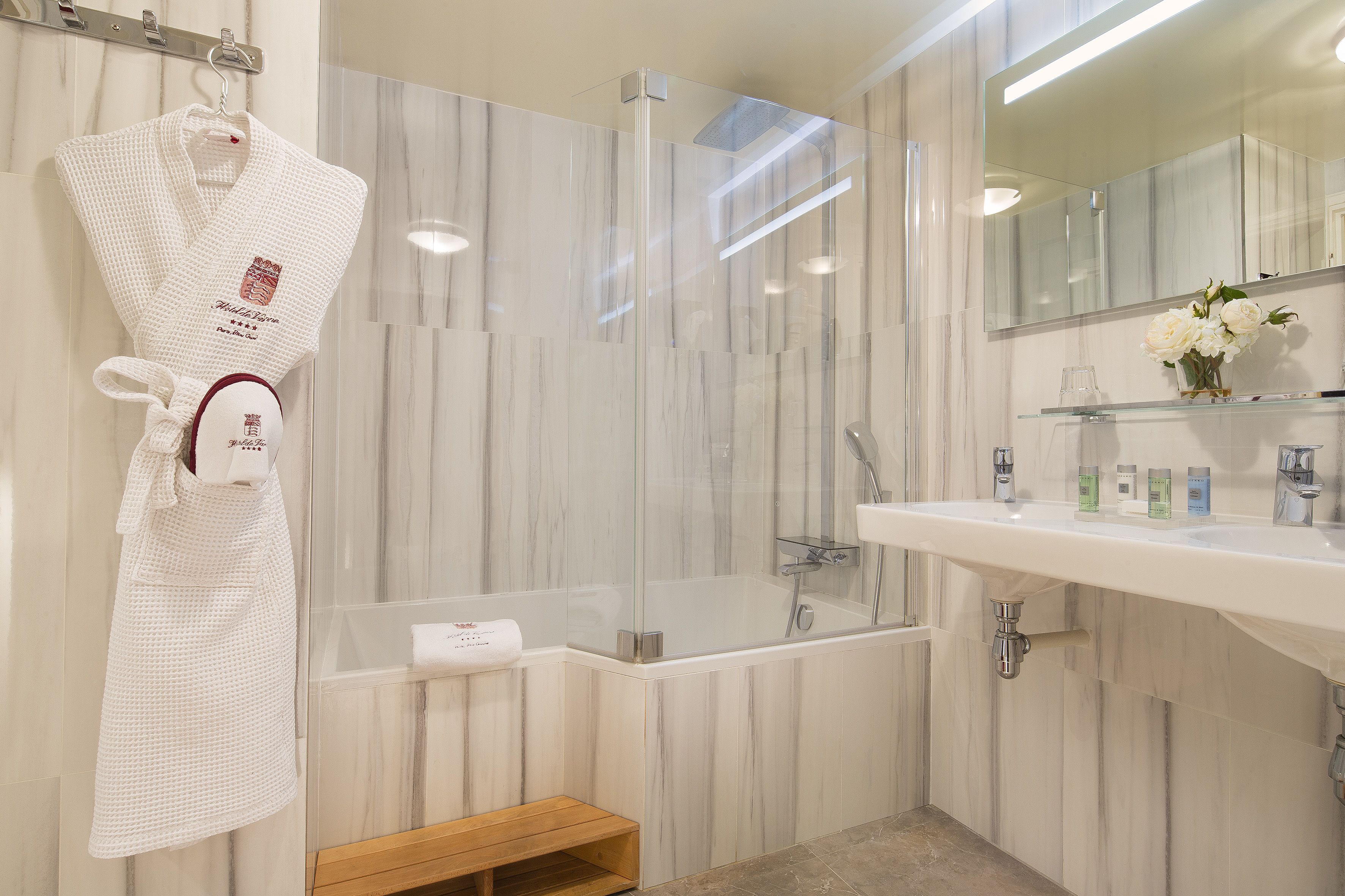 suite | bathroom | hair dryer, bathrobes, slippers, towels