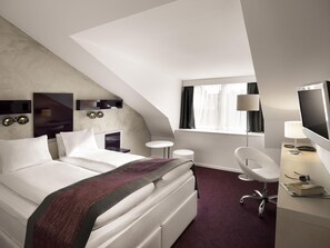 Luxe beddengoed, een bureau, verduisterende gordijnen, gratis wifi