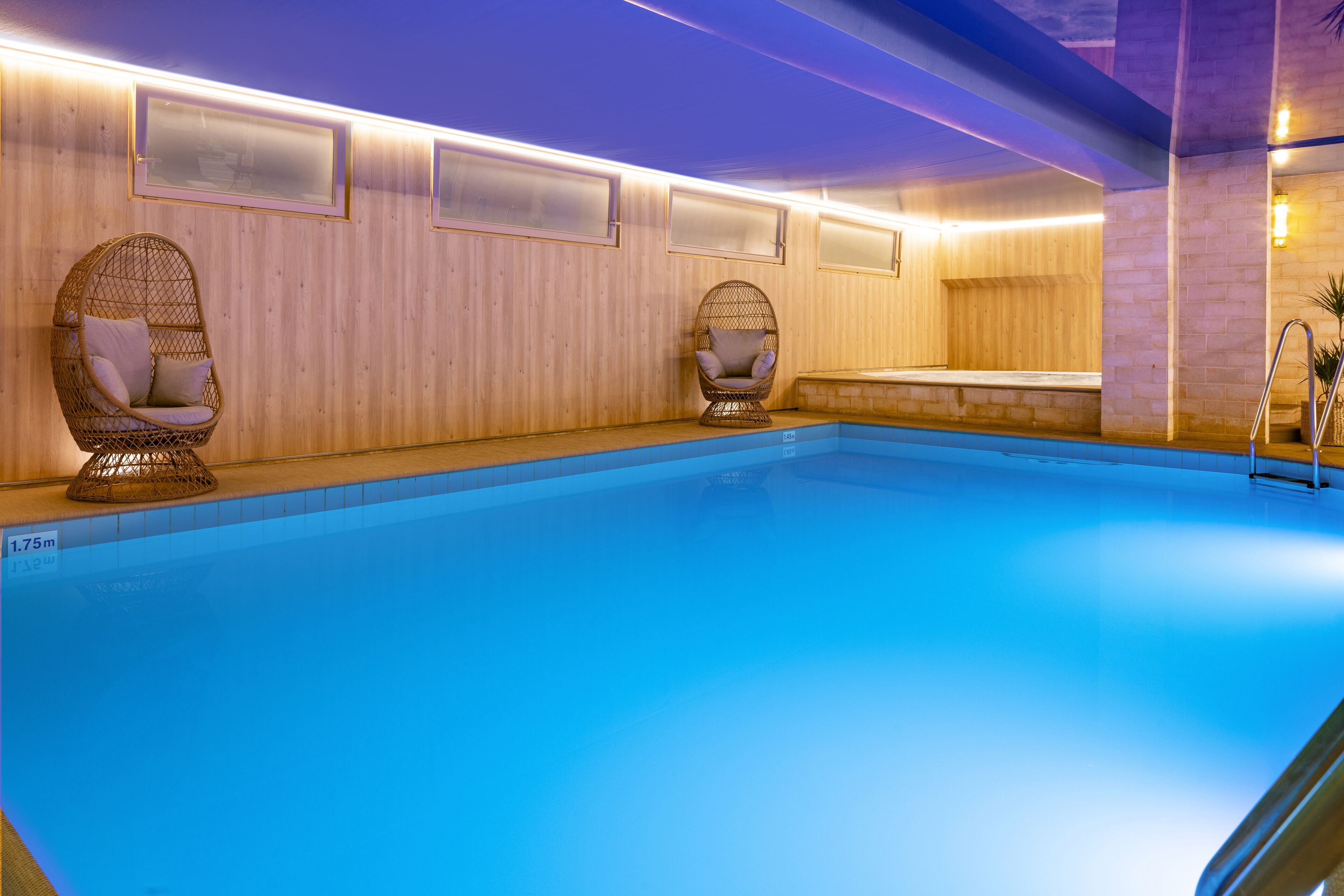 indoor pool, open 7:00 am to 10:00 pm, free pool cabanas, pool loungers