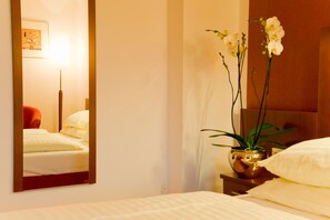 Standard Double Room | Minibar, in-room safe, desk, iron/ironing board