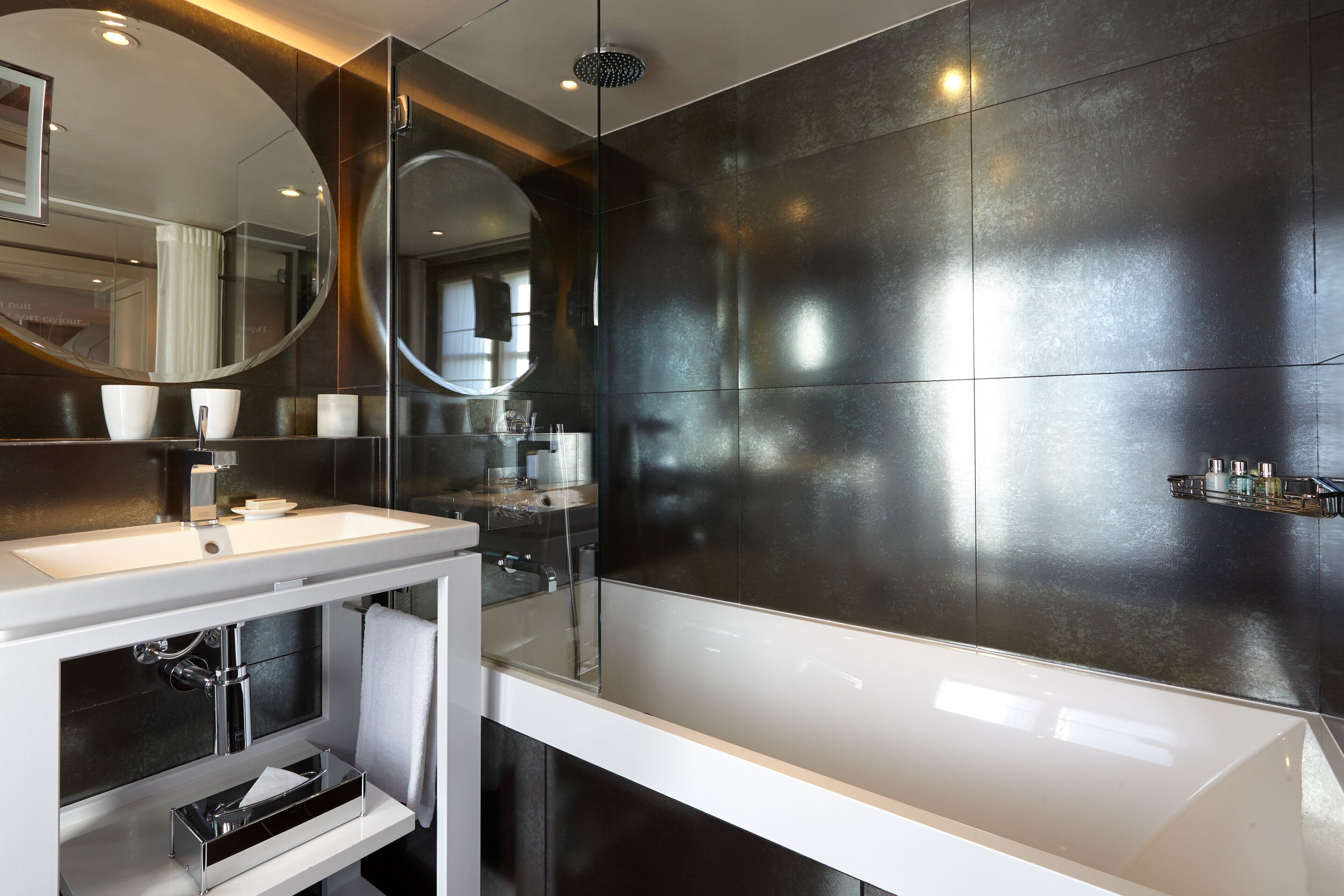 junior suite | bathroom | designer toiletries, hair dryer, bathrobes, slippers