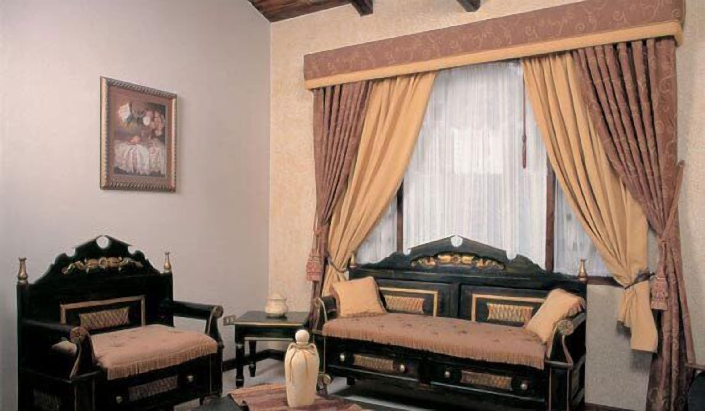 standard double room | living area | 36-inch tv with cable channels, fireplace