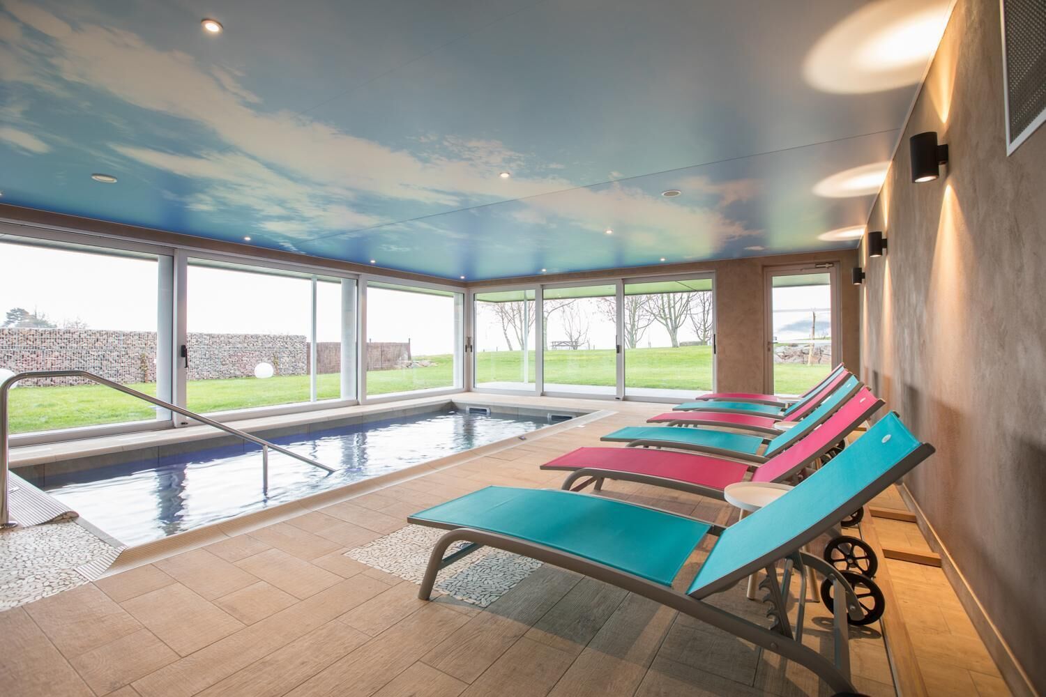 indoor pool, seasonal outdoor pool, open 10:00 am to 7 pm, pool loungers