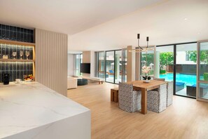 Family Suite, 3 Bedrooms | Living area | 42-inch LCD TV with digital channels, TV