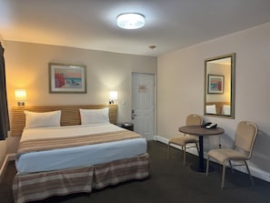 Deluxe Room, 1 King Bed, Kitchenette | In-room safe, desk, blackout drapes, iron/ironing board