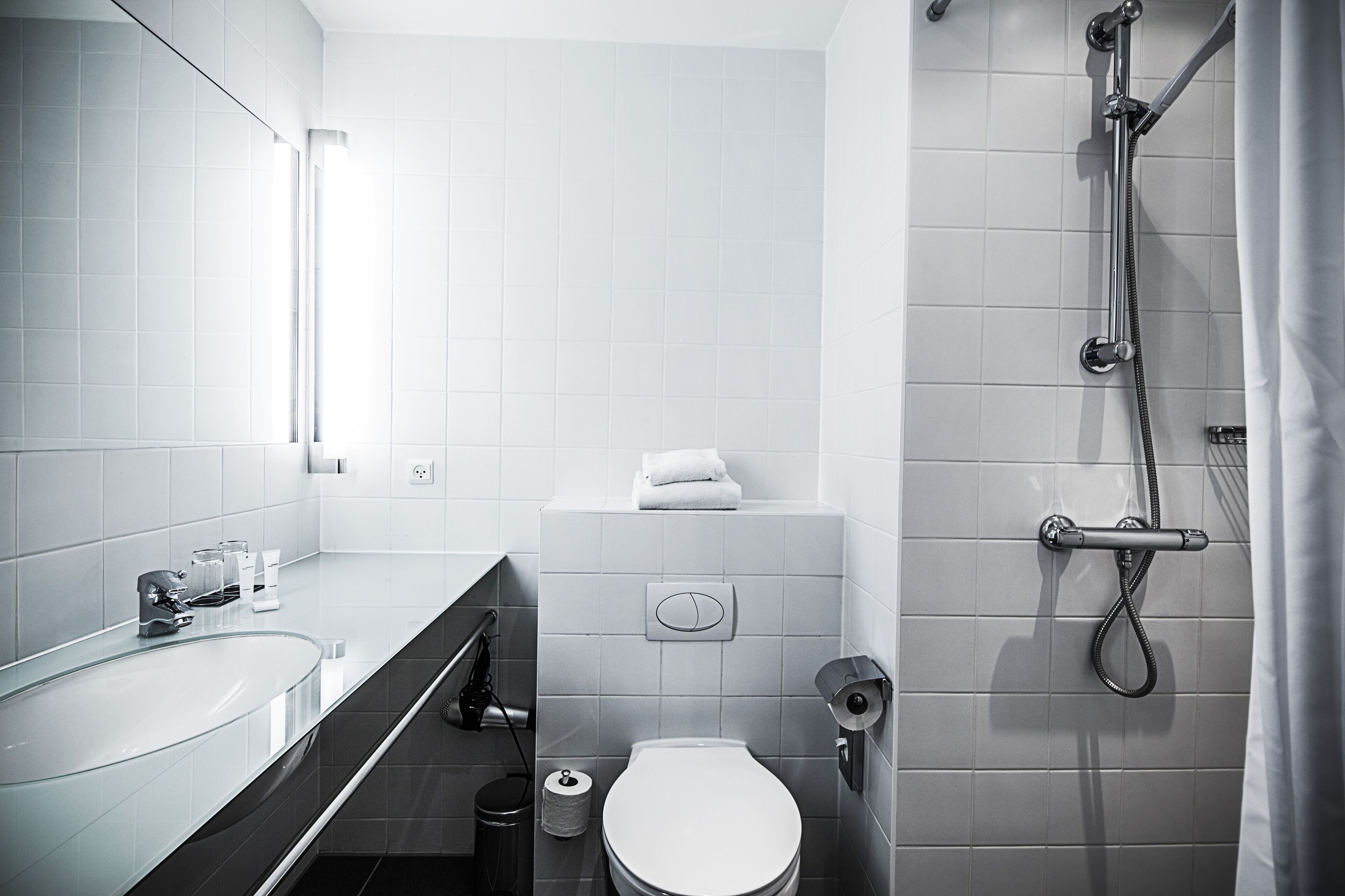 shower, free toiletries, hair dryer, towels