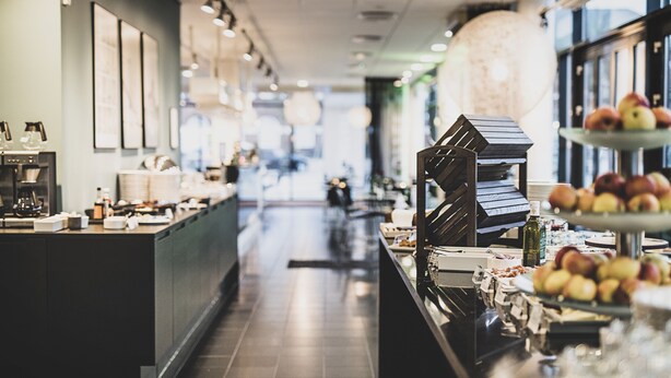 A buffet area with a variety of food items and a coffee station. - Hotel Kolding (Kolding)