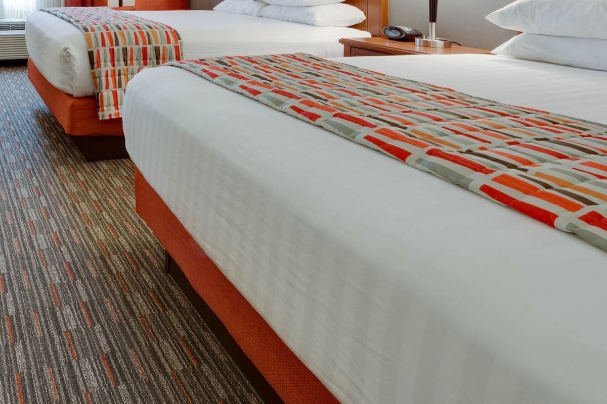 Desk, blackout curtains, iron/ironing board, free cots/infant beds