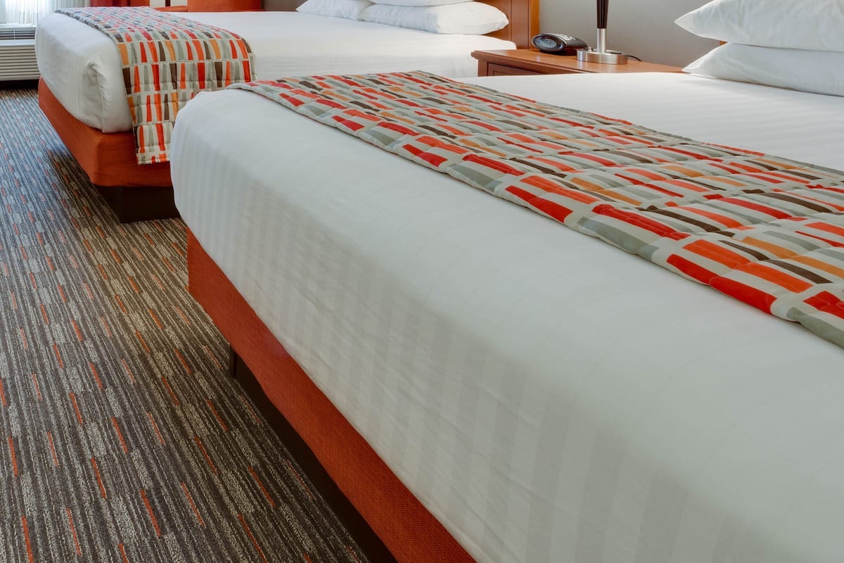 Desk, blackout curtains, iron/ironing board, free cots/infant beds