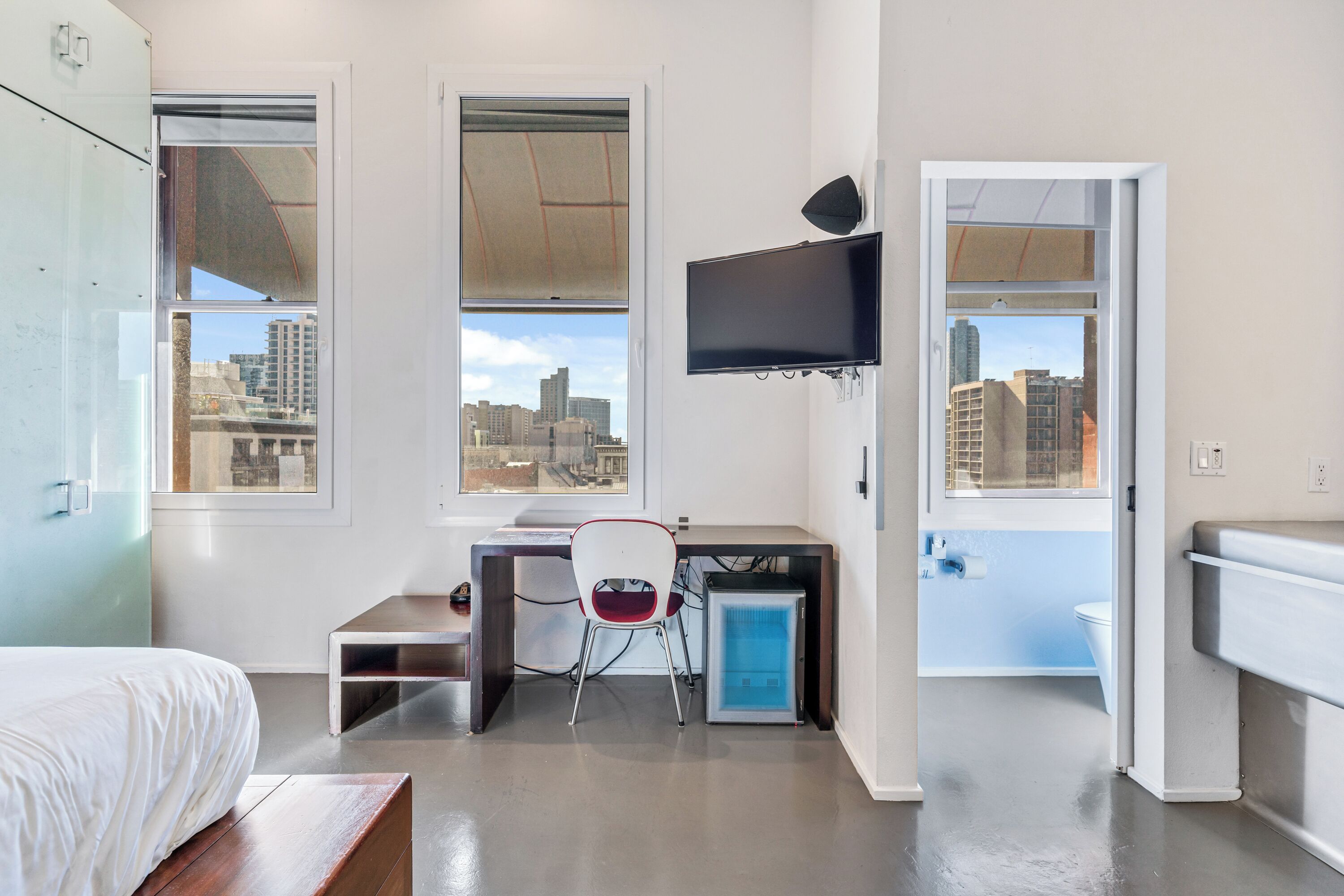 Desk, laptop workspace, blackout curtains, iron/ironing board