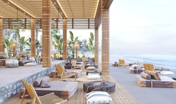 私人海灘、小屋 (收費)、躺椅、太陽傘